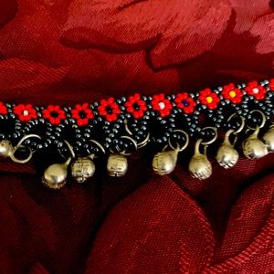 Anklet. Beads and bells.